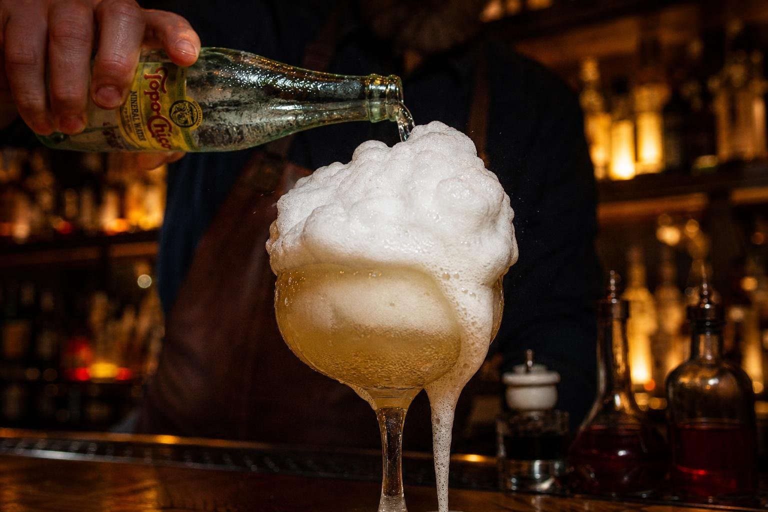 Hero image for "The Ramos Gin Fizz Didn't Get Easier. Bars Just Started Cheating Better."